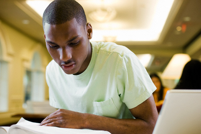 A young man studying