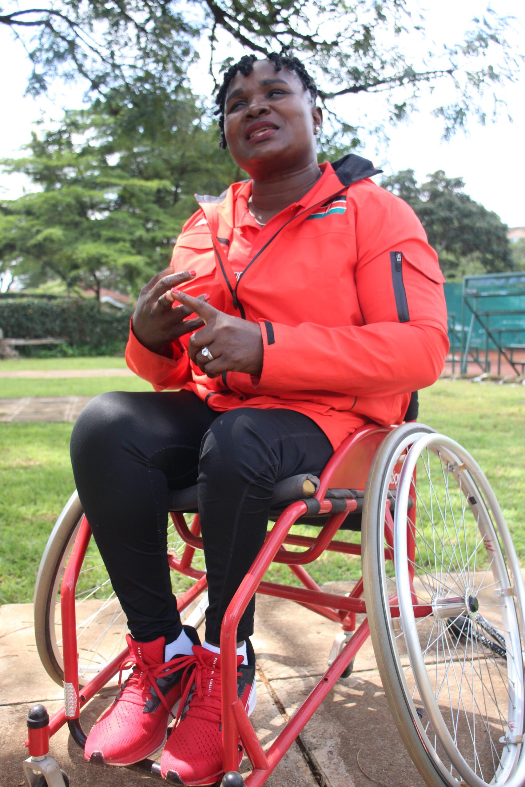 Jane Ndenga, OGW, Executive Director of the Disabled Inclusion Node Association (DINA) and a national wheelchair tennis player. 
