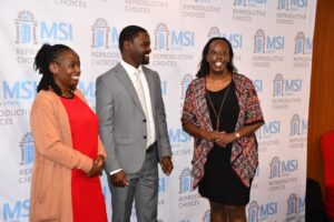 Inviolata Nafula head of Marketing at MSI Dr Walter Obita Country Director MSI and in a black dress Susan Kimani Head of Programs and business development